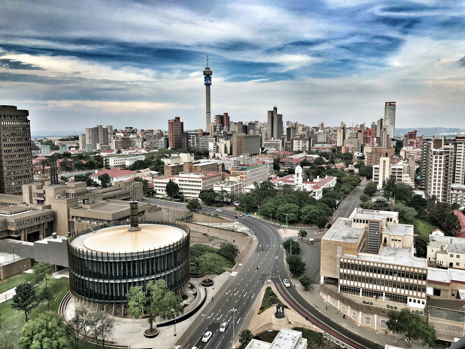 Johannesburg city roads and skyline representing urban shared travel